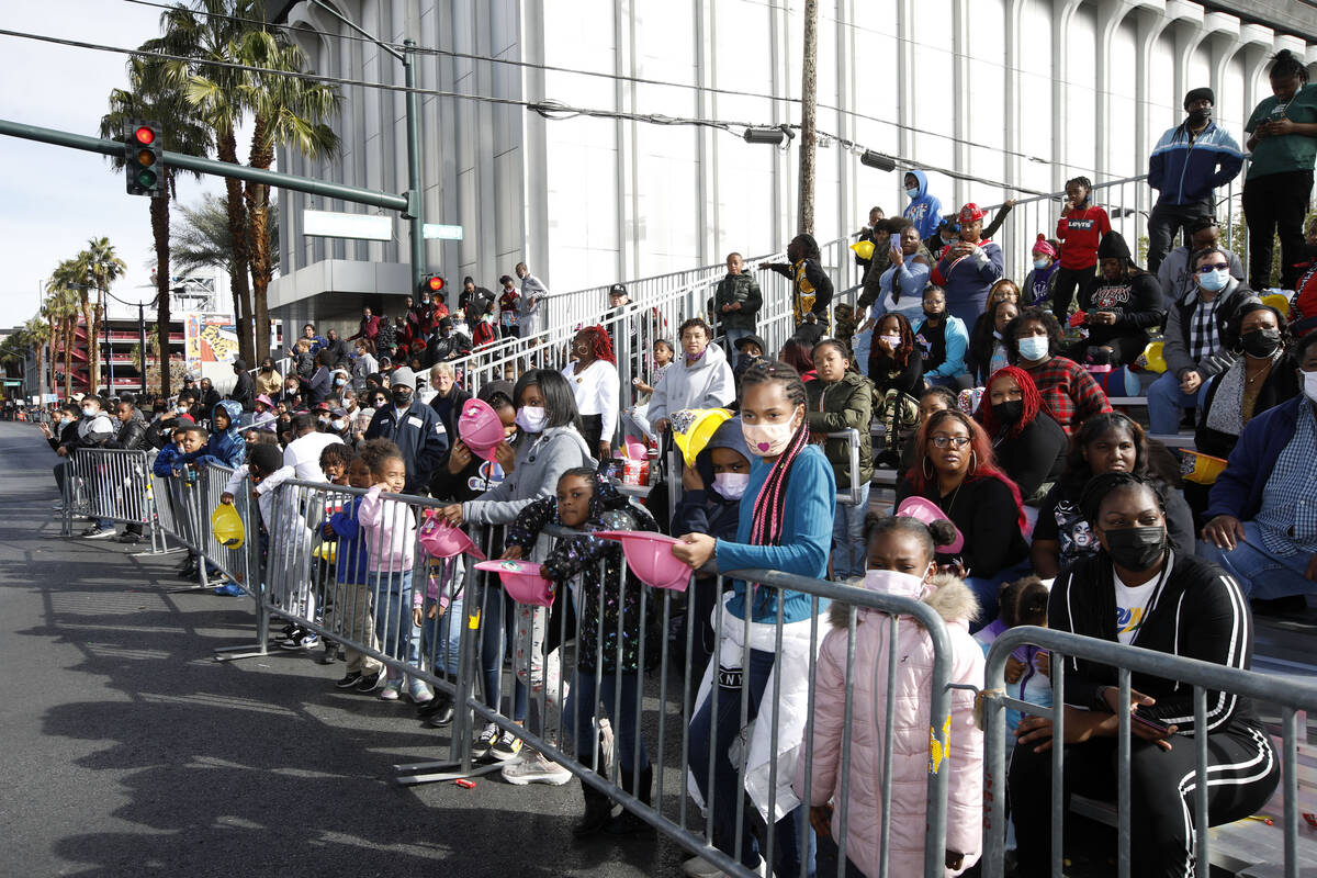 People watch the 40th annual Martin Luther King, Jr. parade, Monday, Jan. 17, 2022, in Las Vega ...
