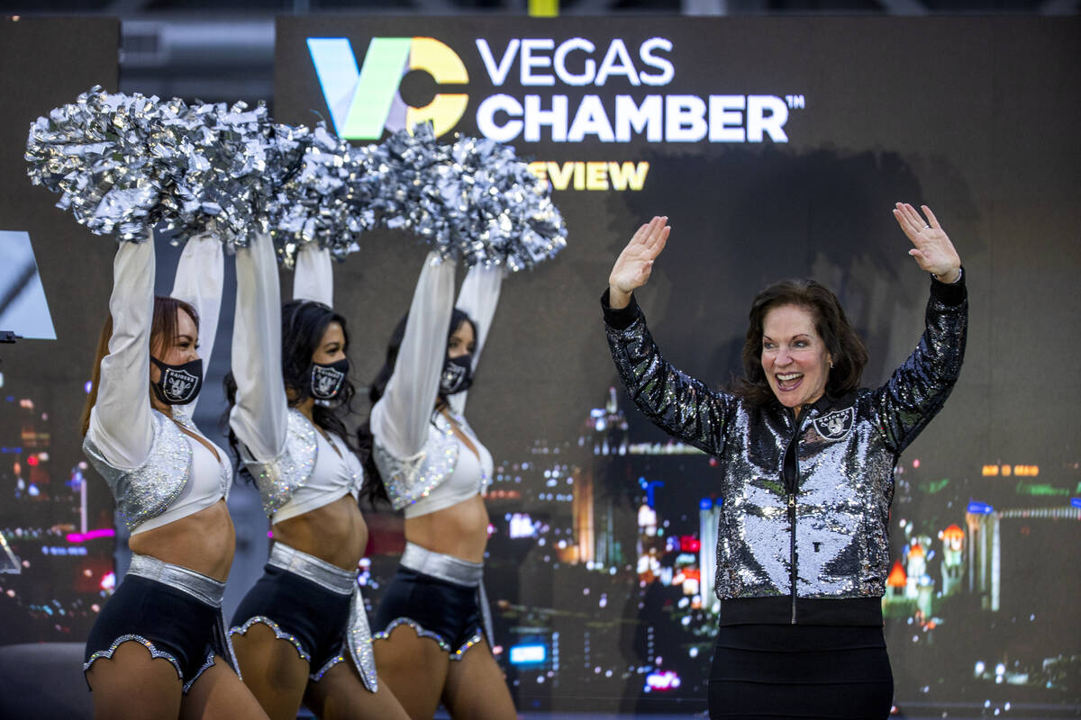 Vegas Chamber President and CEO Mary Beth Sewald, right, greets the crowd as the Raiderettes st ...