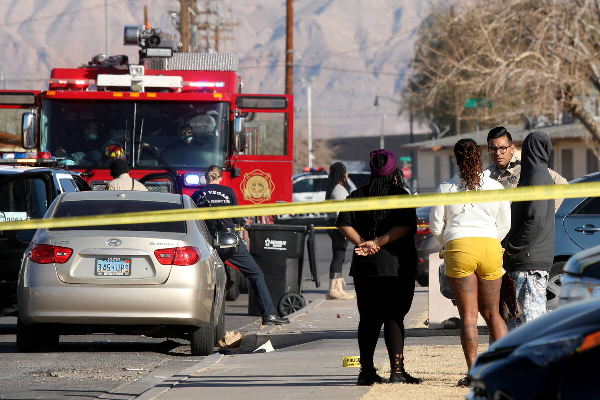 Las Vegas police investigate a homicide around 915 Morgan Avenue, Monday, Jan. 17, 2022, in Las ...