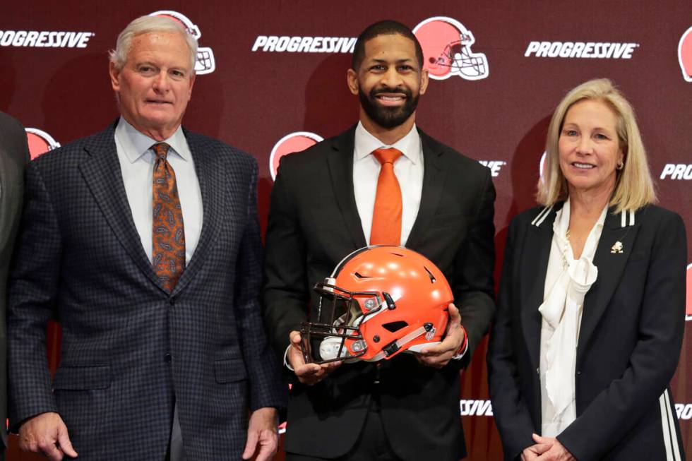 In this Feb. 5, 2020, file photo, Cleveland Browns general manager Andrew Berry, center, poses ...