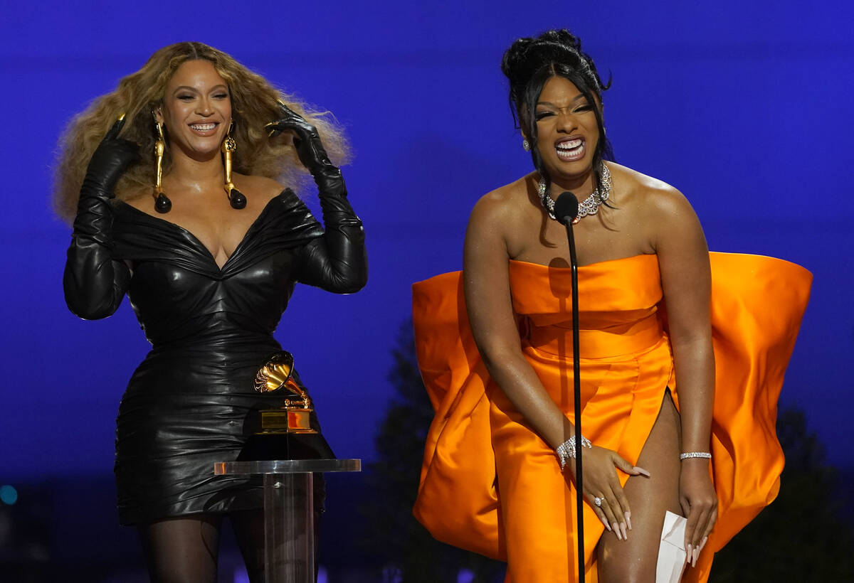 Beyonce, left, and Megan Thee Stallion accept the award for best rap song for "Savage&quot ...