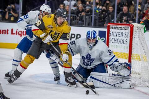 Golden Knights center Mattias Janmark (26) looks for a shot as Toronto Maple Leafs goaltender J ...