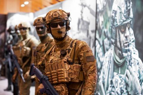 Mannequins dressed in gear from Direct Action at the SHOT Show shooting, hunting and outdoor tr ...