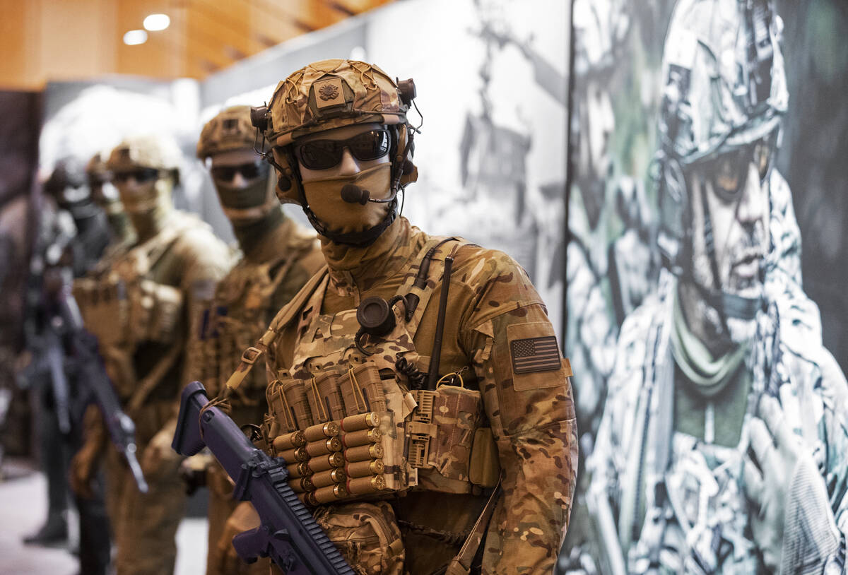 Mannequins dressed in gear from Direct Action at the SHOT Show shooting, hunting and outdoor tr ...