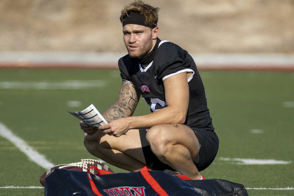 UNLV quarterback Tate Martell (16) observes his teammates during football team practice at Rebe ...