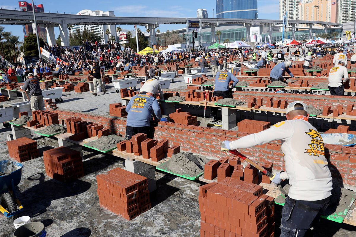 Masons compete in the Bricklayer 500 during the World of Concrete construction trade show at th ...