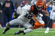 Cincinnati Bengals wide receiver Ja'Marr Chase (1) makes a catch as Raiders cornerback Desmond ...