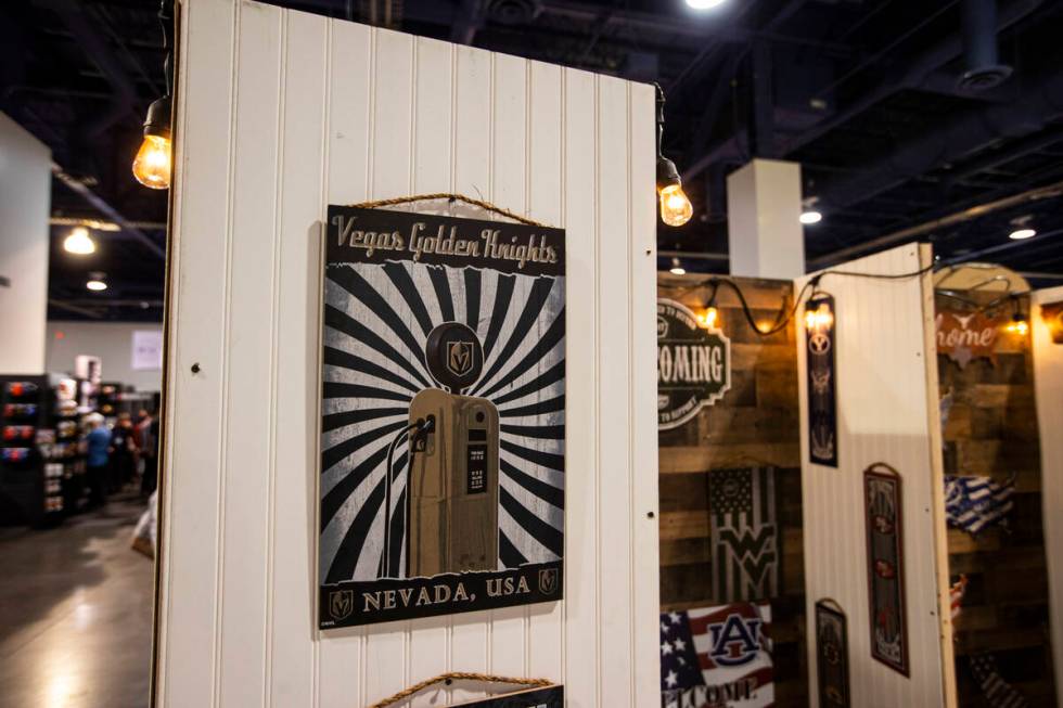 Wooden wall plaques are seen at the Fan Creations booth during the Sports Licensing & Tailg ...