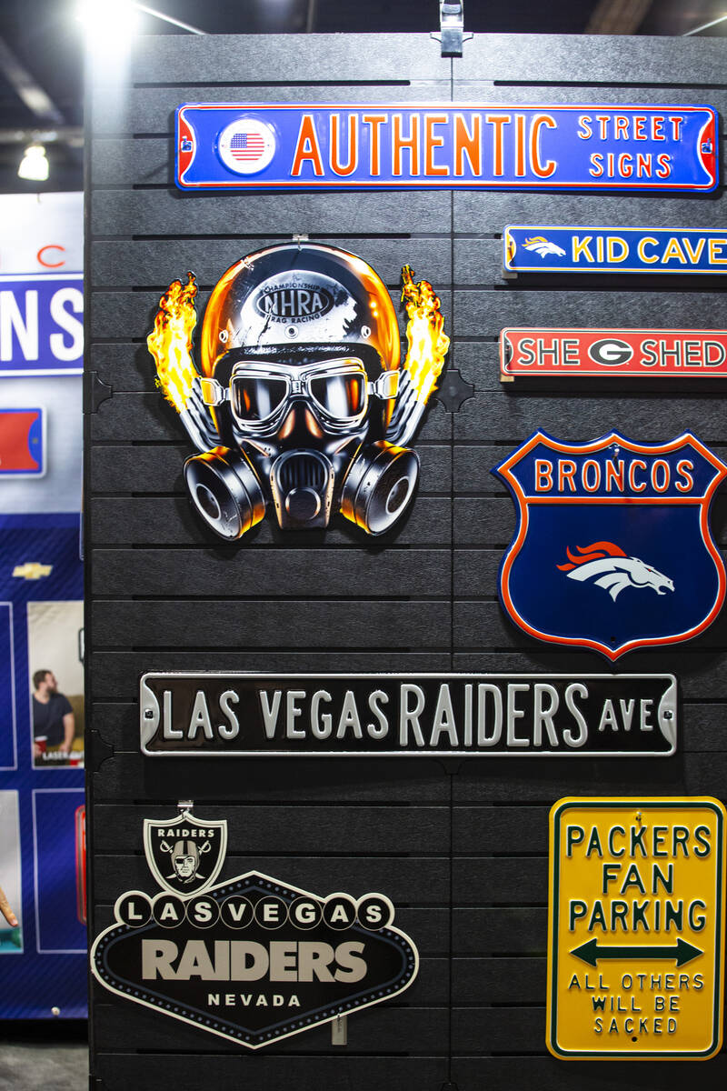 Signs on display at Authentic Street Signs during the Sports Licensing & Tailgate Show at t ...