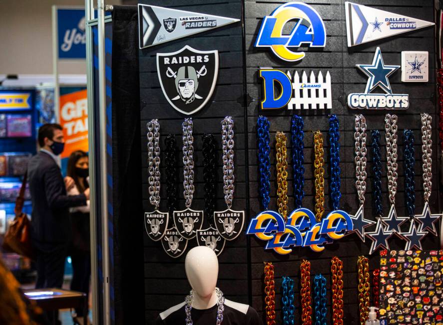 Raiders, Los Angeles Rams and Dallas Cowboys items are seen during the Sports Licensing & T ...