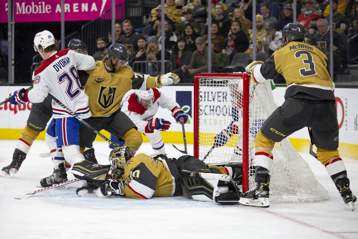 Golden Knights goaltender Robin Lehner (90) unsuccessfully dives to save a shot by Canadiens ri ...