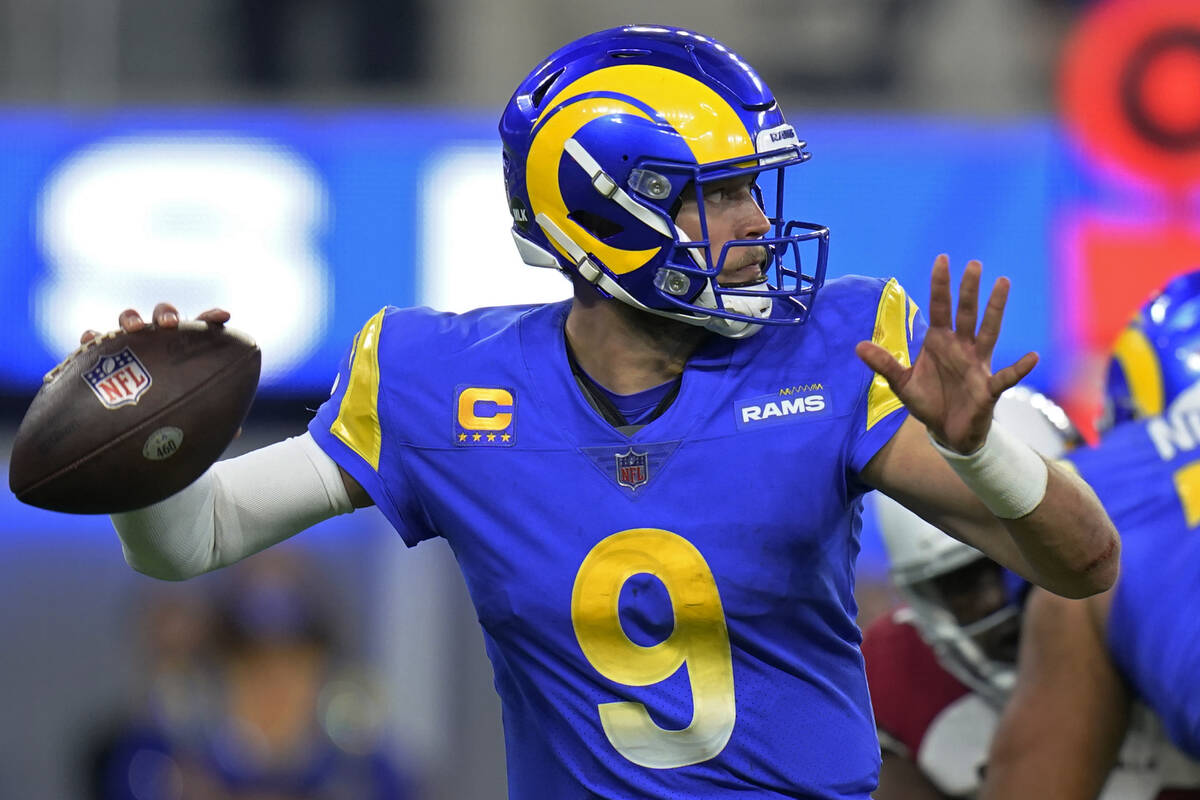Los Angeles Rams quarterback Matthew Stafford (9) passes against the Arizona Cardinals during t ...