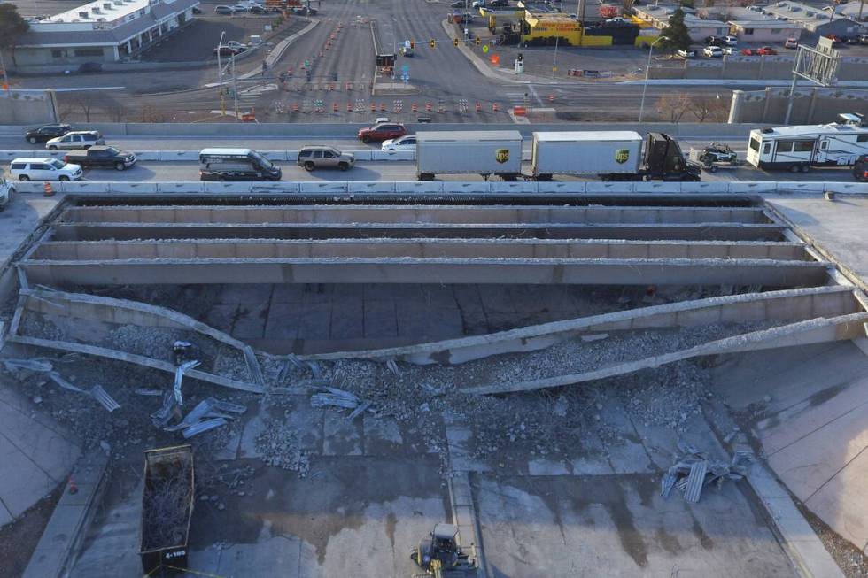 An aerial photo taken on Friday, Jan. 21, 2022, shows a portion of a bridge that was collapsed ...
