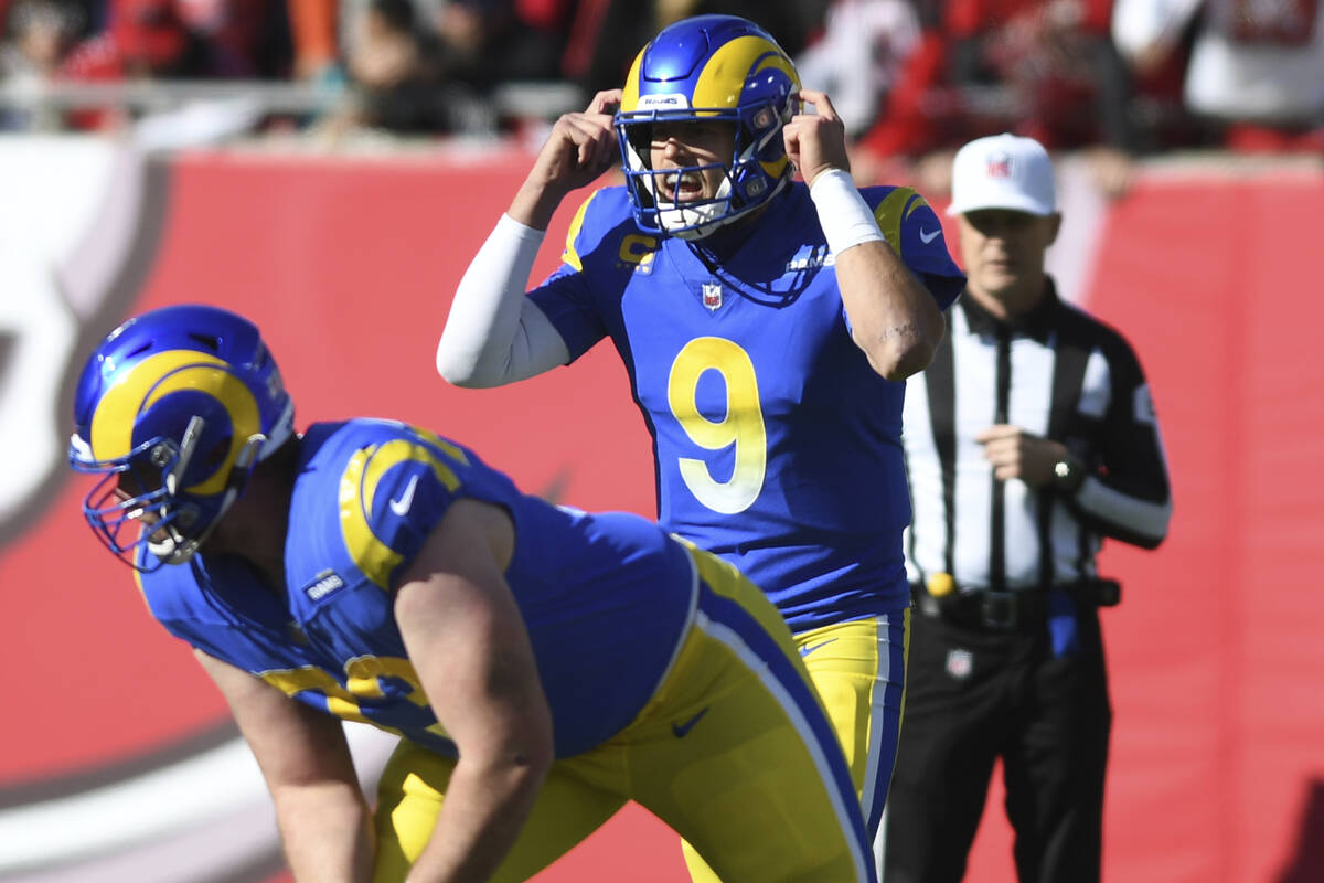 Los Angeles Rams quarterback Matthew Stafford (9) calls a play against the Tampa Bay Buccaneers ...