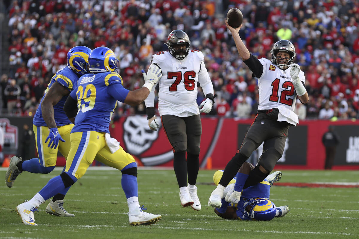 Tampa Bay Buccaneers quarterback Tom Brady (12) throws a pass against the Los Angeles Rams duri ...