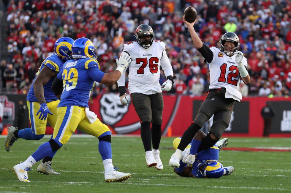 Tampa Bay Buccaneers quarterback Tom Brady (12) throws a pass against the Los Angeles Rams duri ...