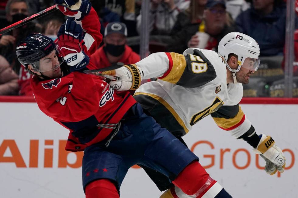 Vegas Golden Knights left wing William Carrier (28) fights for position against Washington Capi ...