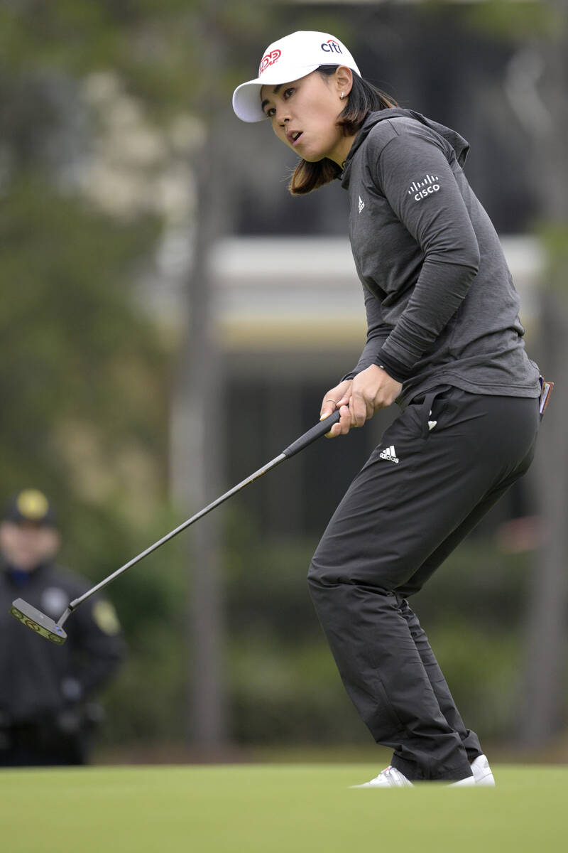 Danielle Kang reacts after barely missing a putt on the 17th green during the final round of th ...