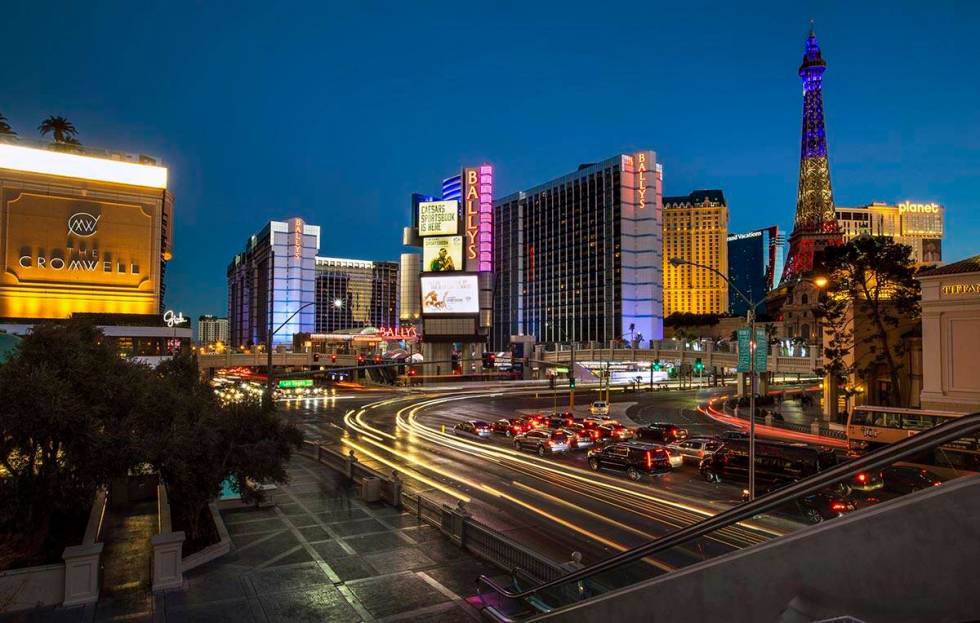 Cars stream along East Flamingo Road near the exterior of Bally’s Las Vegas which will b ...