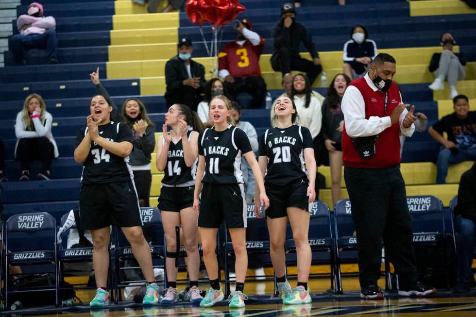 The Desert Oasis bench cheers as their team takes the lead in the last minute of a girls high s ...