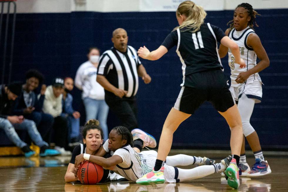 Desert Oasis’ Olivia Bigger, left, and Spring Valley’s Kiara Williams, second fro ...