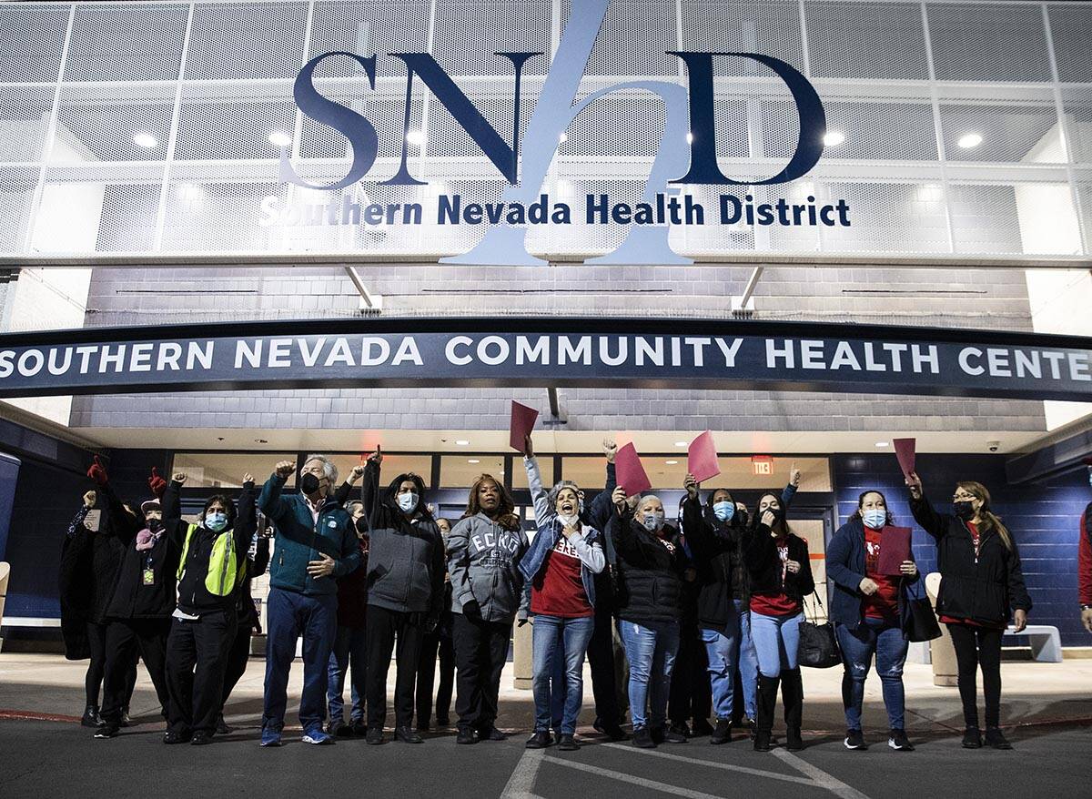Culinary Union guest room attendants, hold a rally in front of Southern Nevada Health District ...
