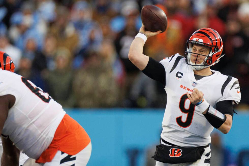 Cincinnati Bengals quarterback Joe Burrow (9) passes the ball against the Tennessee Titans duri ...