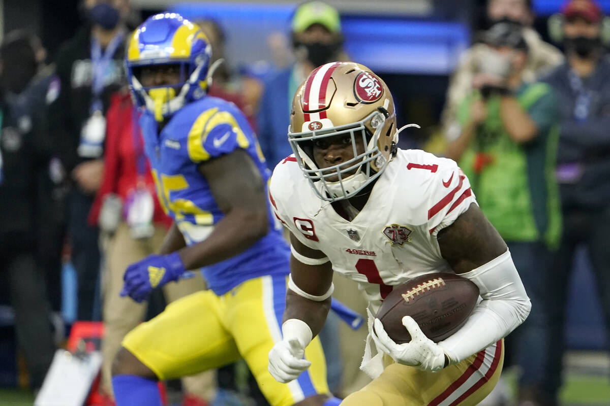 San Francisco 49ers' Jimmie Ward intercepts a pass during the first half of the NFC Championshi ...