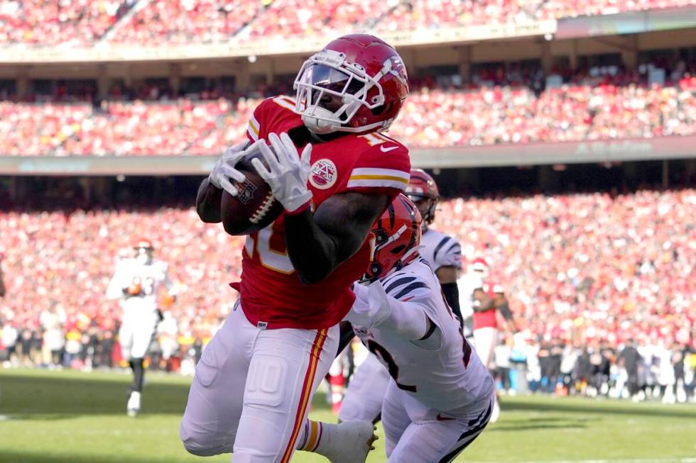 Kansas City Chiefs wide receiver Tyreek Hill (10) catches a 10-yard touchdown pass during the f ...