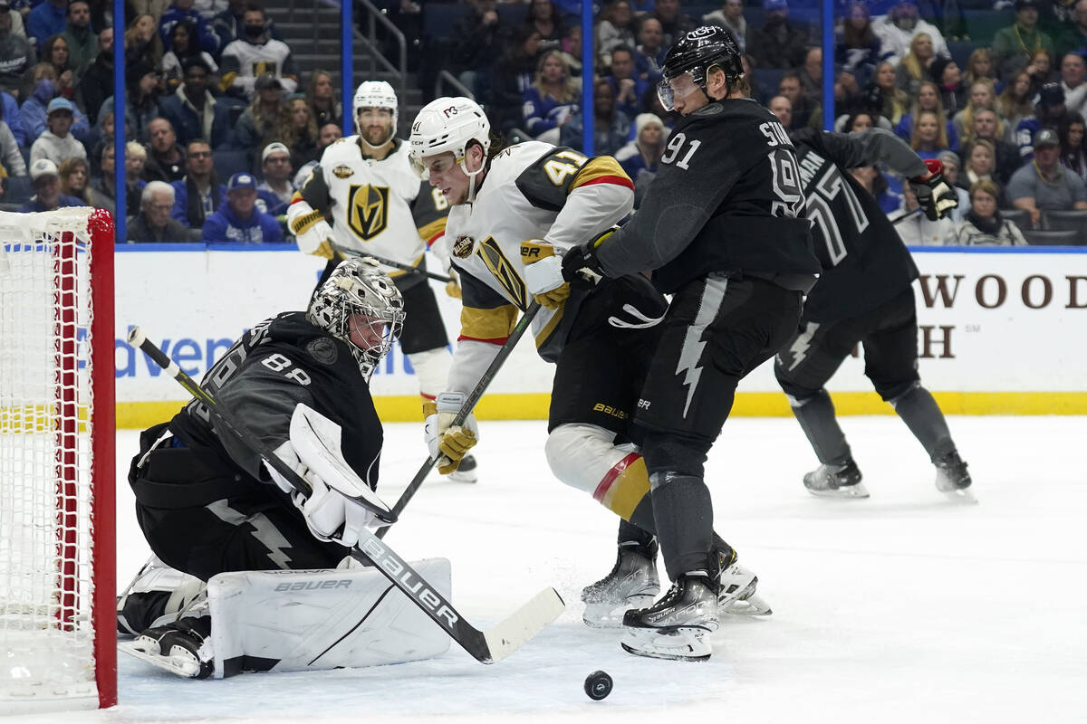 Tampa Bay Lightning goaltender Andrei Vasilevskiy (88) makes a save as Tampa Bay Lightning cent ...