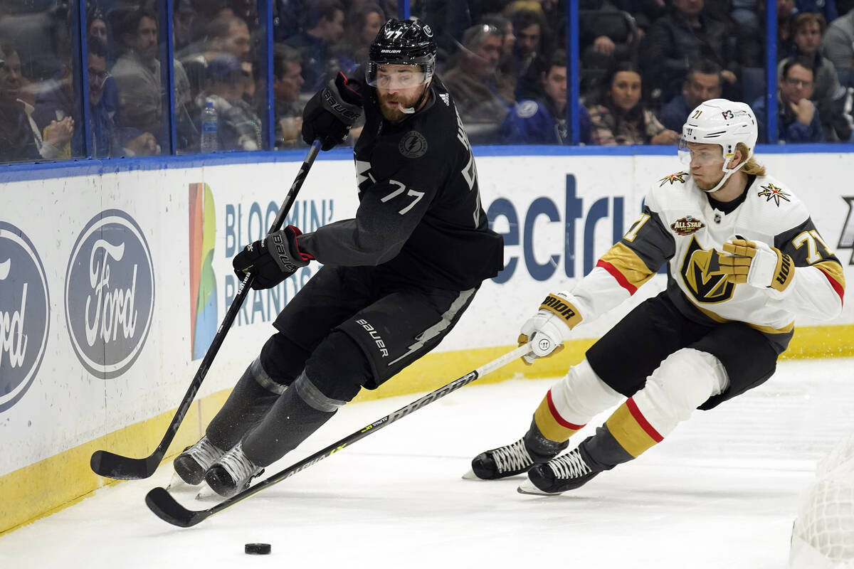 Tampa Bay Lightning defenseman Victor Hedman (77) moves the puck past Vegas Golden Knights cent ...