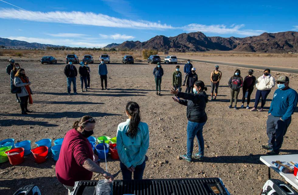 Almendra Johnson, Volunteer Program Director with Get Outdoors Nevada instructs volunteers on c ...