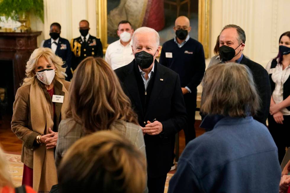 President Joe Biden speaks with spouses of members of the National Governors Association after ...