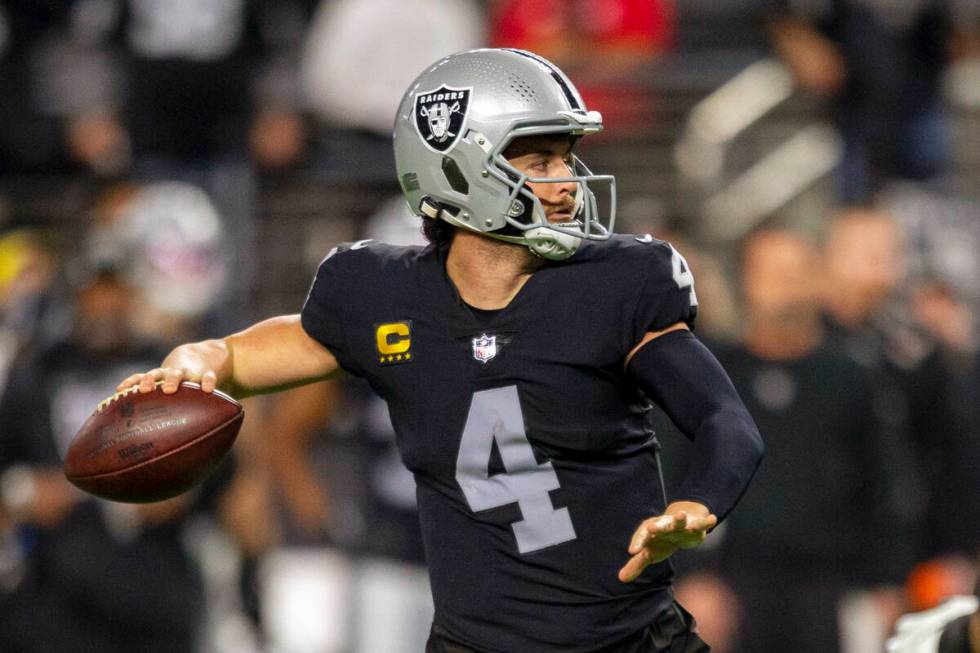 Raiders quarterback Derek Carr (4) throws the football during the first half of an NFL football ...