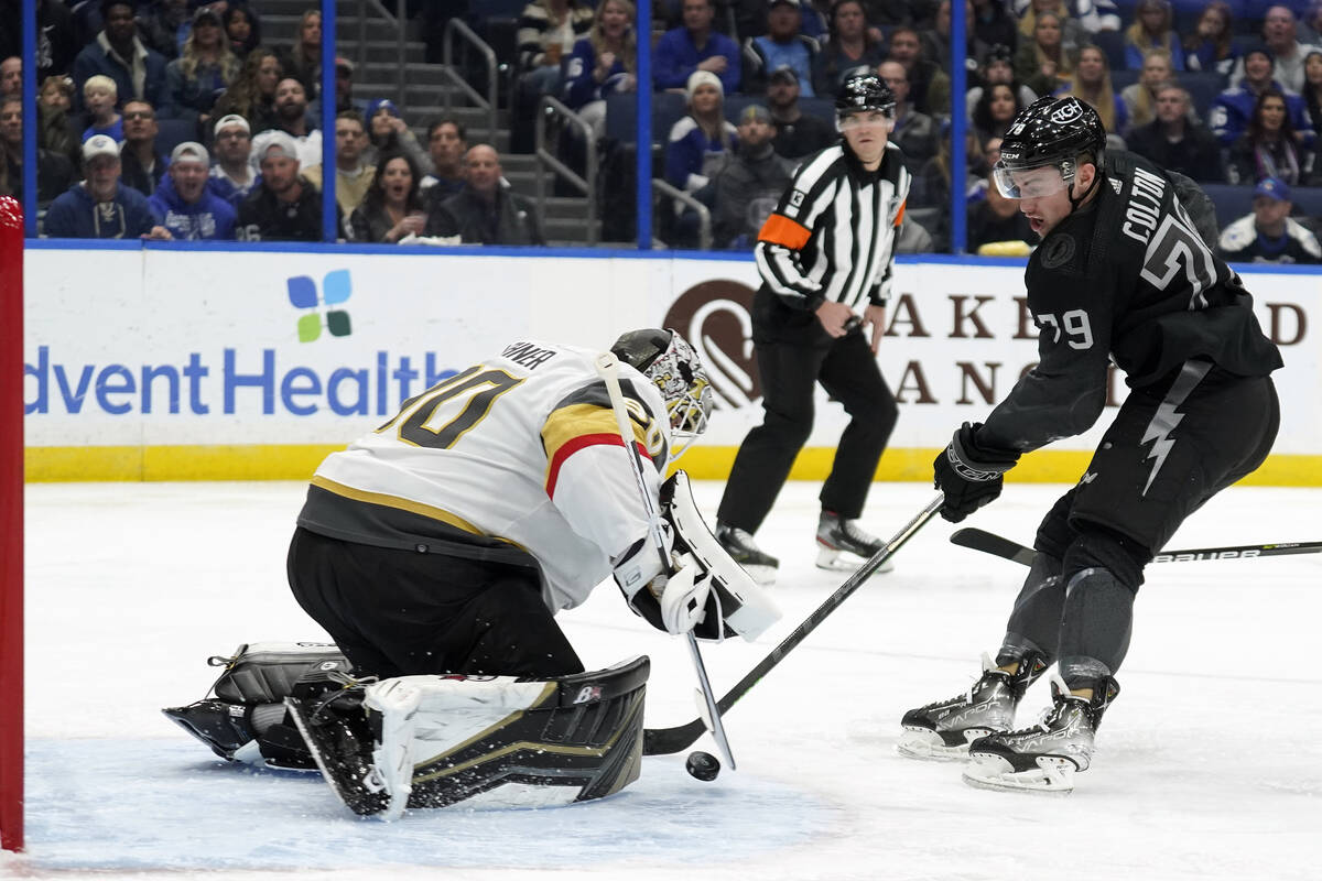 Vegas Golden Knights goaltender Robin Lehner (90) makes a save on a shot by Tampa Bay Lightning ...