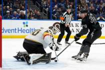 Vegas Golden Knights goaltender Robin Lehner (90) makes a save on a shot by Tampa Bay Lightning ...