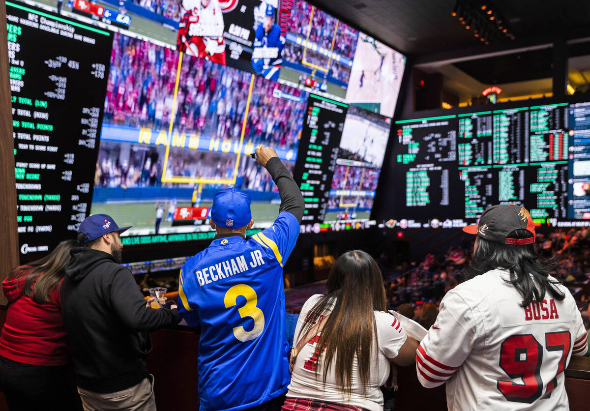 Los Angeles Rams and San Francisco 49ers fans watch the NFC Championship NFL football game at C ...