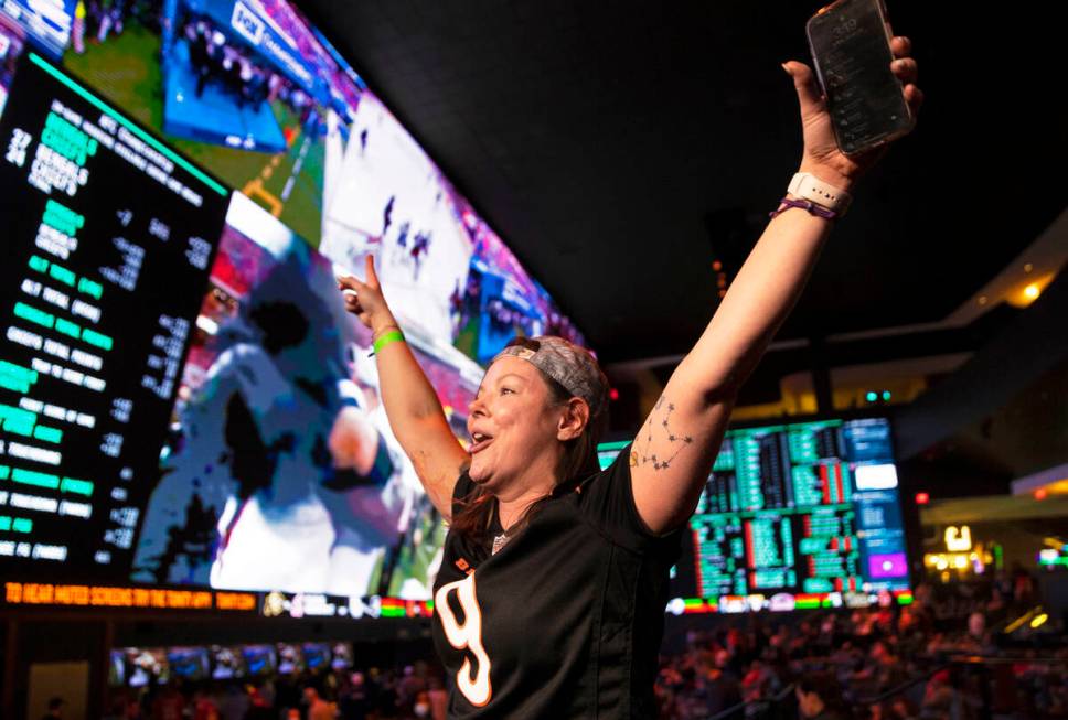 Bengals fan Steph Boyer, from Denver, Colo., cheers for Cincinnati during the AFC Championship ...