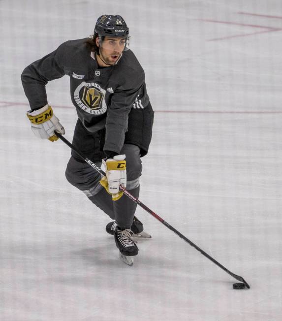 Vegas Golden Knights defenseman Nic Hague handles the puck during practice at City National Are ...