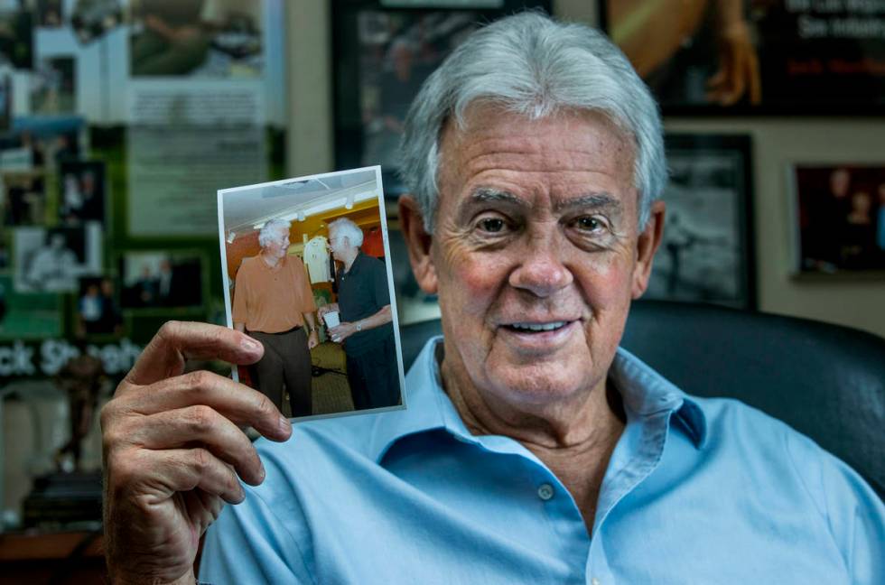 Author Jack Sheehan in his home office with a photo of legendary former drug kingpin Jimmy Chag ...