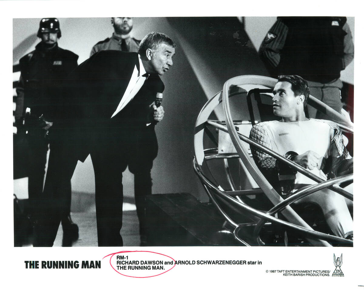 Richard Dawson and Arnold Schwarzenegger star in "The Running Man." (Taft Entertainment Picture ...
