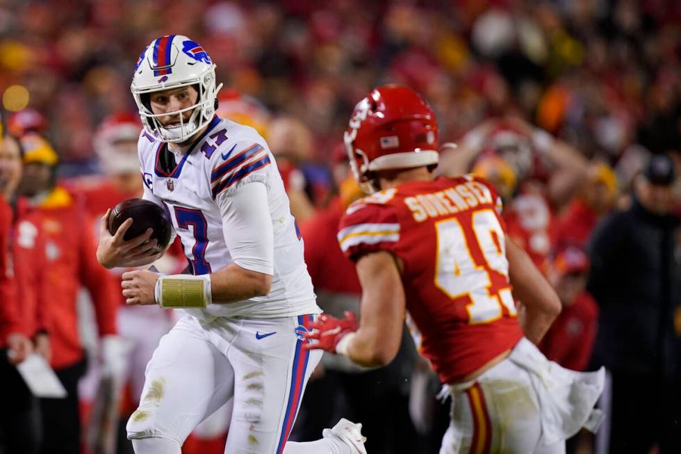 Buffalo Bills quarterback Josh Allen (17) runs from Kansas City Chiefs safety Daniel Sorensen ( ...