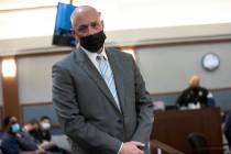 Anthony Dishari, accused of a hate crime against an Asian American business owner, appears in c ...