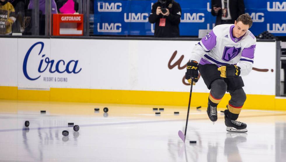 Golden Knights center Ben Jones (4) warms up before the first period of an NHL game at T-Mobile ...