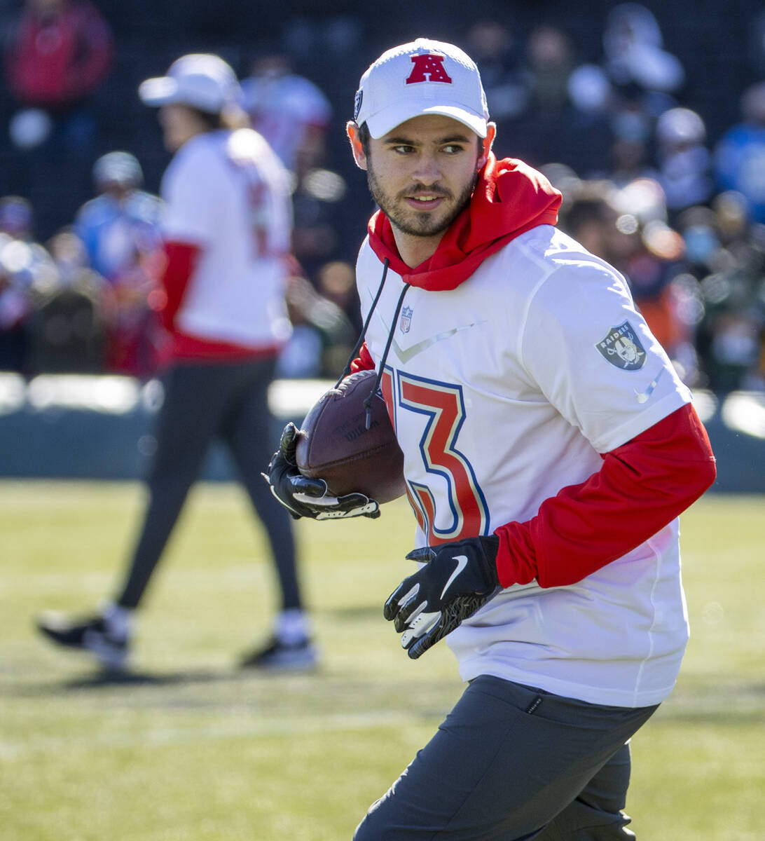 Raiders wide receiver Hunter Renfrow runs after catching a pass during AFC Pro Bowl team practi ...