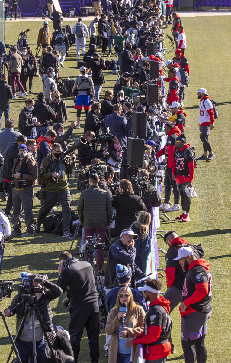 Players do media interviews during AFC Pro Bowl team practice at the Las Vegas Ballpark on Thur ...