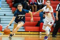 Coronado guard Kaylee Walters (14) dribbles past Liberty guard Isabella Jaramillo (2) during th ...