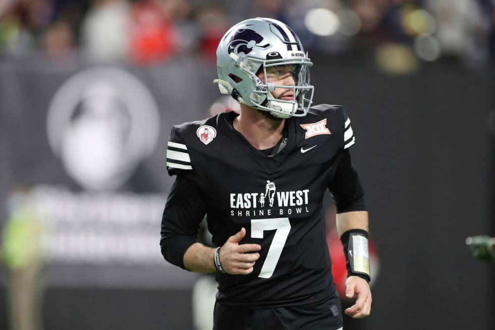 West quarterback Skylar Thompson, of Kansas State, (7) in action against the East during the Ea ...