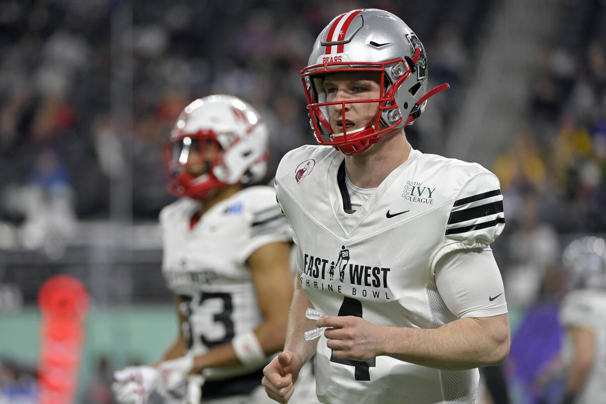 East quarterback EJ Perry (4), of Brown, runs off the field during the second half of the East- ...