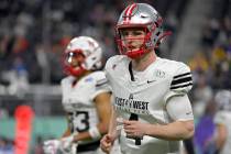 East quarterback EJ Perry (4), of Brown, runs off the field during the second half of the East- ...